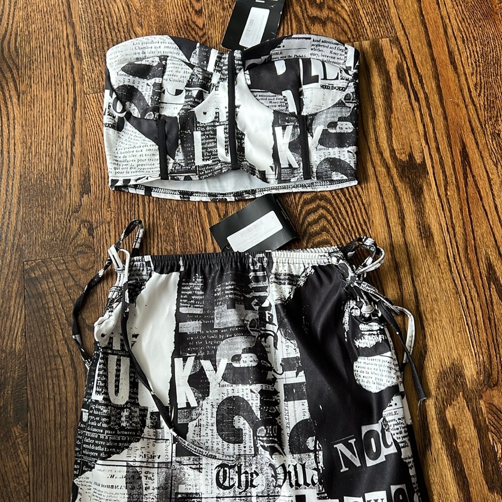 Pretty little thing newspaper set brand new!
